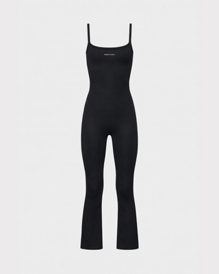 Black jumpsuit with thin straps on a light gray background