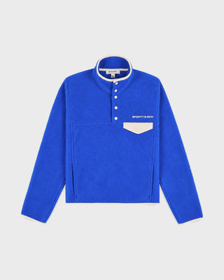 Emma Bold Logo Polar Sweatshirt in vibrant blue with a snap-button mock neck and a cream chest pocket.