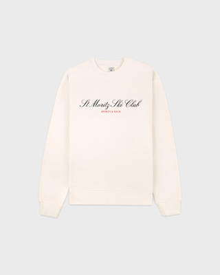 Cream Emmett Ski Club Crewneck sweatshirt with St Moritz Ski Club printed on the chest.