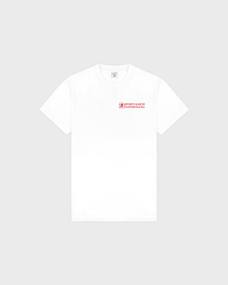 A white short-sleeve crewneck t-shirt with a small red 'Sporty & Rich' logo printed on the left chest, displayed on a light gray background.