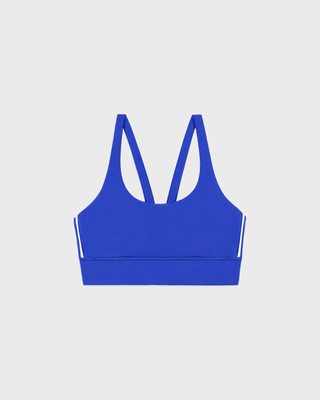 Flor Bold Logo Active Bra in vibrant blue performance fabric with white side stripe detailing.