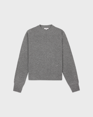 Itzel S Logo Cashmere Sweater in medium heather gray, a long-sleeved crewneck with a small chest logo.