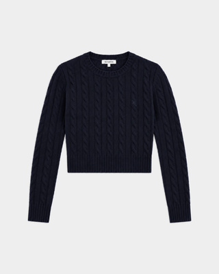 Jala SRC Cable Cropped Sweater in dark navy, a slim-fit, long-sleeve cable knit featuring a crew neck and crafted from a luxurious cashmere-wool blend, laid flat on a white background.