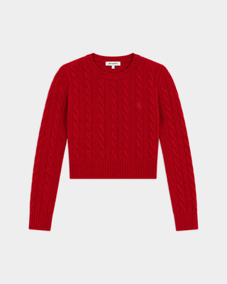 Jala SRC Cable Cropped Sweater in Ruby, featuring a slim fit, long sleeves, cable-knit design, and crew neck, laid flat on a white background.