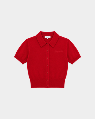 Jannie Signature Logo Cashmere SS Cardigan in Ruby featuring a short-sleeve button-up design with a collar and cropped length, laid flat on a white background.