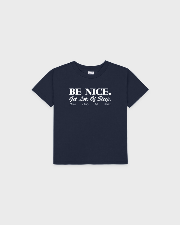 Soft, breathable Karen Be Nice Kids Tshirt - Dark Navy with white text: BE NICE. Get Lots Of Sleep. Drink Water.