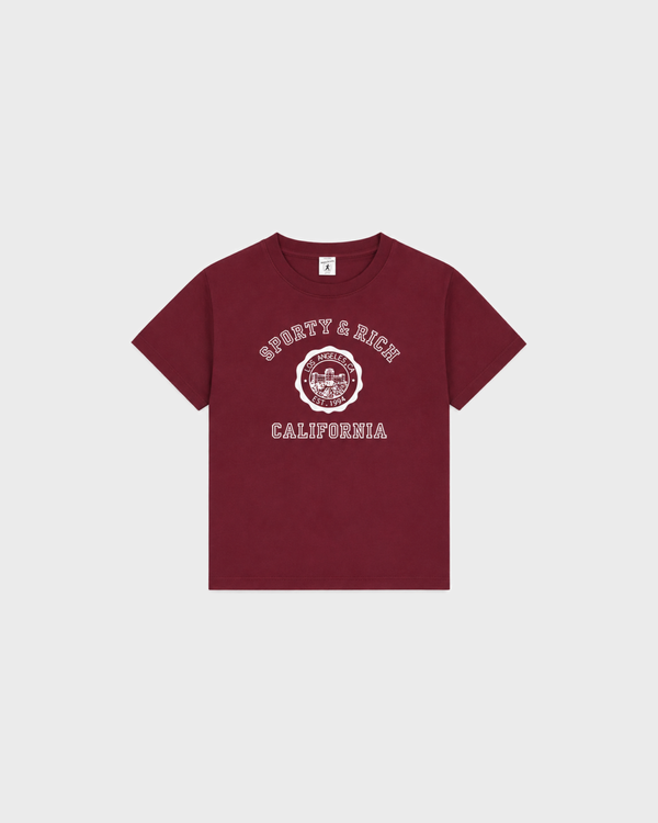 Karen California Emblem Kids Tshirt - Merlot: a soft, maroon short-sleeved tee with a white Sporty & Rich graphic.
