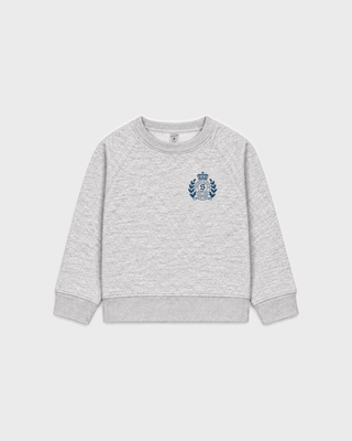Kenza NY Crest Kids Crewneck in heather gray cotton polyester with a navy blue chest emblem.