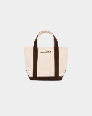 Minnie Serif Logo Mini Tote in natural cotton canvas with chocolate brown handles, base, and logo.