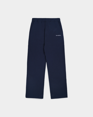 Besma Serif Logo Embroidered Baggy Sweatpant in dark navy, featuring an oversized fit with an elastic waistband and side pockets, laid flat on a white background.