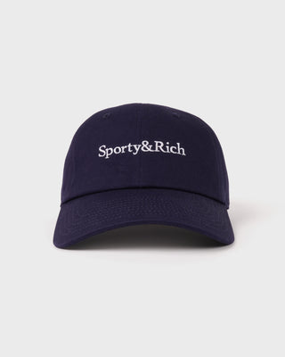 The Maeve Serif Logo Hat in Dark Navy features “Sporty & Rich” embroidered in white on the front and includes an adjustable back closure for a comfortable fit.