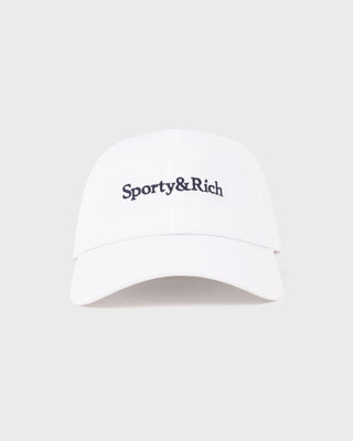 Maeve Serif Logo Hat in white with “Sporty&Rich” embroidered in black on the front, featuring a classic vintage design and an adjustable back closure, shown on a plain background.