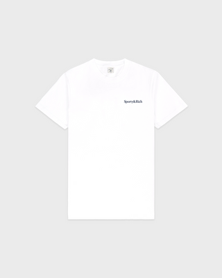 Fema Serif Logo Tshirt - White: a unisex T-shirt crafted from 100% cotton, showcasing the Sporty & Rich logo in small black serif text on the left chest, set against a plain background.
