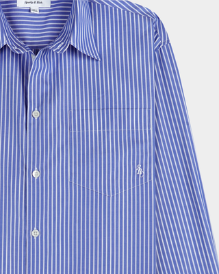 Coco SRC Oversized Shirt - Blue Striped: an oversized blue and white vertical striped button-down with a chest pocket.