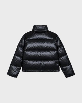 Black Devan Bold Logo Mountain Puffer with a boxy fit, mock neck, front zip, and white chest logo.
