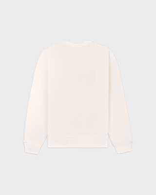 Cream Emmett Ski Club Crewneck sweatshirt with St Moritz Ski Club printed on the chest.