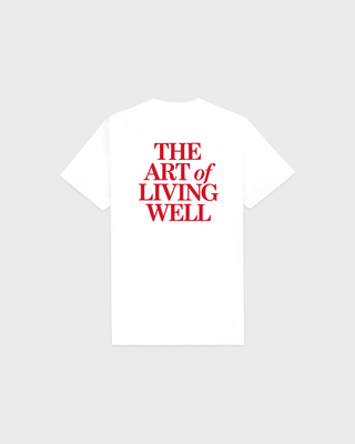 White Cameron Art Tshirt with a small red logo on the chest.