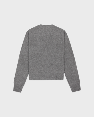 Itzel S Logo Cashmere Sweater in medium heather gray, a long-sleeved crewneck with a small chest logo.