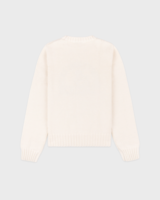 Ivylee Cross Country Knitted Sweater - Ecru: a cream, breathable knit with a skier graphic and red club text.