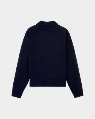 Izar S Logo Cashmere Polo in dark navy, a long-sleeve knit sweater crafted from a luxurious cashmere-wool blend, featuring a classic buttoned collar with three buttons, shown laid flat on a white background.
