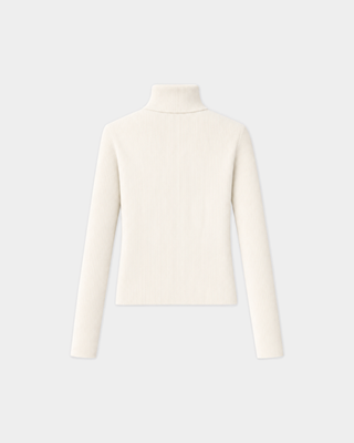 Jacoba Horse Ribbed Turtleneck - Ecru: off-white merino wool ribbed sweater with a brown horse-riding graphic.