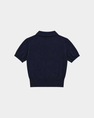 Jannie Signature Logo Cashmere SS Cardigan in Dark Navy—this cropped, short-sleeve knit features a button front, classic collar, and subtle signature embroidery on the left chest for a modern touch.