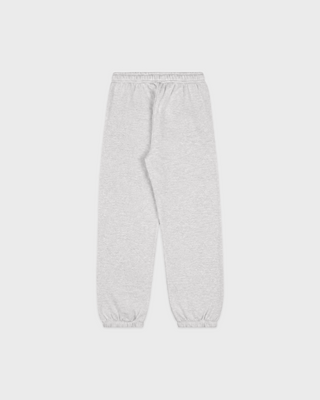 Kais Wellness Ivy Kids Jogger in heather gray with WELLNESS printed in dark blue on the left hip.