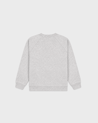 Kenza NY Crest Kids Crewneck in heather gray cotton polyester with a navy blue chest emblem.