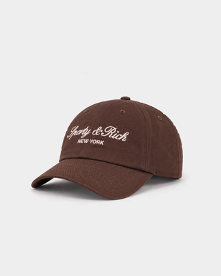 Maeve Vendome Script Hat - Chocolate: brown unstructured baseball cap with white Sporty & Rich NEW YORK embroidery.