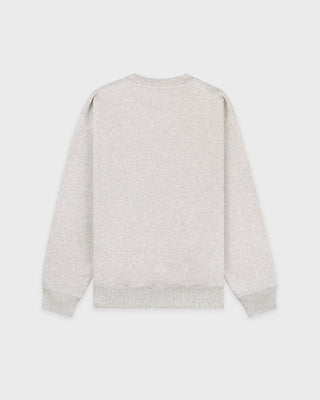 The Eeva Serif Logo Embroidered Crewneck in Heather Gray features a classic crewneck design with long sleeves and subtle white embroidered text on the left chest, making it perfect for fans of vintage-style sweatshirts.