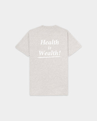 Fema Serif Logo Tshirt - Heather Gray: a unisex short-sleeve tee in light heather gray, made from 100% cotton, featuring small white serif logo text on the left chest, shown against a plain background.