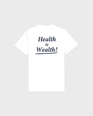 Fema Serif Logo Tshirt - White: a unisex T-shirt crafted from 100% cotton, showcasing the Sporty & Rich logo in small black serif text on the left chest, set against a plain background.