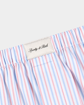 Brice Signature Logo Pyjama Pants in blue, white, and red stripes featuring a comfortable unisex fit and wide-leg design, laid flat on a plain white background.