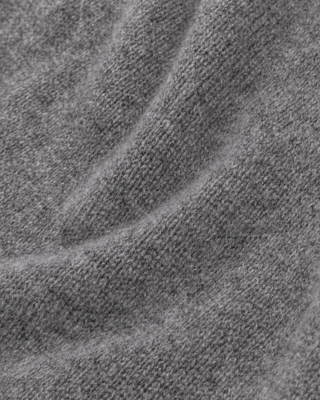 Itzel S Logo Cashmere Sweater in medium heather gray, a long-sleeved crewneck with a small chest logo.