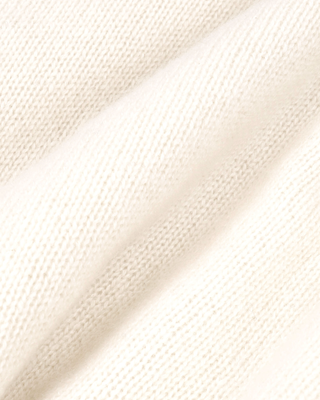 Ivana S Logo Cashmere Trousers in cream, featuring a wide-leg knit, drawstring waist, and embroidered hip logo.