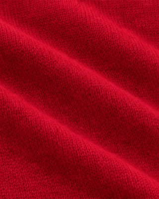 Jannie Signature Logo Cashmere SS Cardigan in Ruby featuring a short-sleeve button-up design with a collar and cropped length, laid flat on a white background.