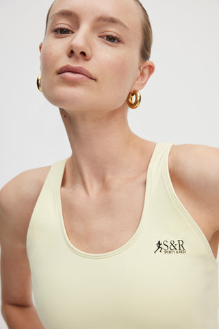 Action Logo Sports Bra - Faded Yellow/Black