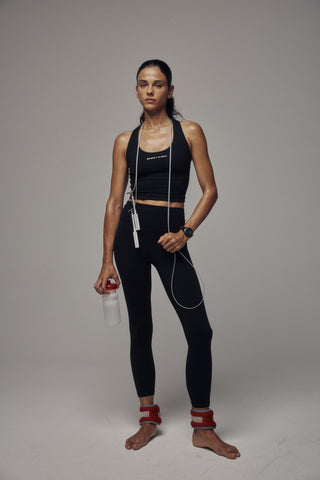 Bonnie Bold Logo Legging - Black, shown against a plain white background, features a high-waisted design for a supportive fit and is crafted from opaque activewear material.