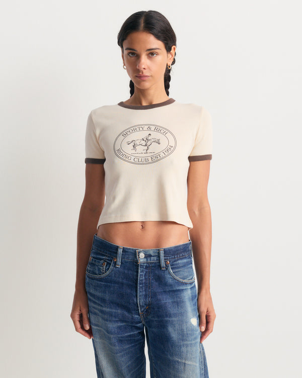 Fatou Riding Club Ringer Tee in cream with chocolate trim and a vintage athletic horse graphic.