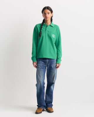 Kelly Perry Riding Club Longsleeve Pique Polo with a chest pocket and a circular logo patch.