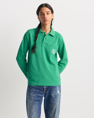 Kelly Perry Riding Club Longsleeve Pique Polo with a chest pocket and a circular logo patch.