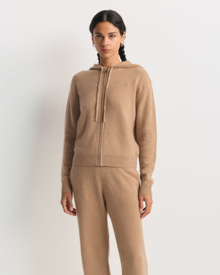 S Logo Cashmere Trousers in camel: tan wide-leg knit style with an embroidered hip logo and drawstring waist.