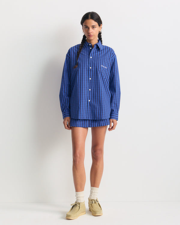 Aya Signature Logo Poplin Skirt - Blue Check: a boxy mini skirt in cotton poplin with an elastic waistband.