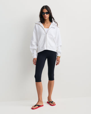 Capri Bold Logo Sports Capri - Black high-waisted cropped leggings displayed on a plain white background, perfect for those who love minimal style with a touch of ’90s shape.