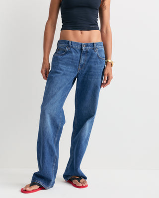 Baggy Jean - Indigo Wash laid flat on a white background, featuring front pockets and belt loops for a relaxed leg fit.