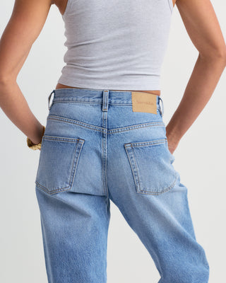 Loose Jean - Light Wash high rise straight-leg jeans laid flat on a white background.