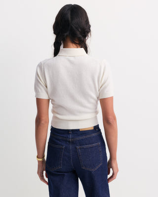Jannie Signature Logo Cashmere SS Cardigan in Off White, featuring a short-sleeve cropped design with front buttons, displayed on a plain background.