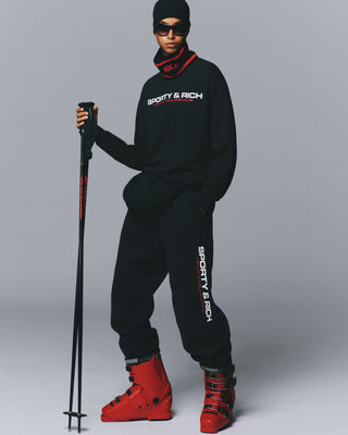 Black long-sleeved 100% cotton Flyod Bold Health Longsleeve - Black with SPORTY & RICH HEALTH & WELLNESS CLUB printed.