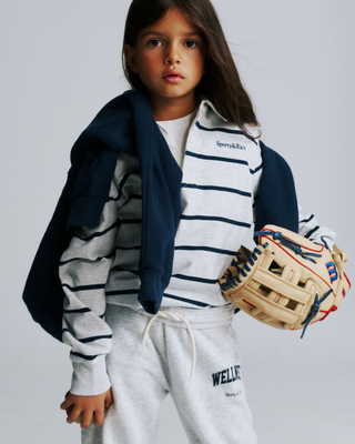 Kao Serif Logo Kids Rugby Polo in heather grey and navy with a white collar and a small logo on the chest.