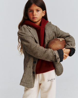 Cream-colored Kais Vendome LA Kids Jogger with a logo on the left hip.